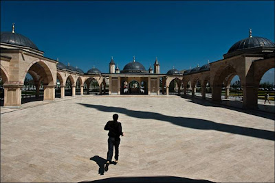 The Akhmad Kadyrov Mosque (Russian — Mechet Akhmata Kadyrova) is located in Grozny, the capital of Chechnya. It is one of the largest mosques in Russia and is officially known as the "The Heart of Chechnya" , Russian — Serdtse Chechni). The mosque is named after Akhmad Kadyrov who commissioned its construction from the mayor of Konya. The mosque design with a set of 62-metre (203 ft)-tall minarets is based on the Blue Mosque in Istanbul. On October 16, 2008, the mosque was officially opened in a ceremony in which Chechen leader Ramzan Kadyrov spoke and was with Russian Prime Minister Vladimir Putin. In this mosque, ten thousand Muslims can pray at a time and its minarets reach 62 metres (203 ft) high.