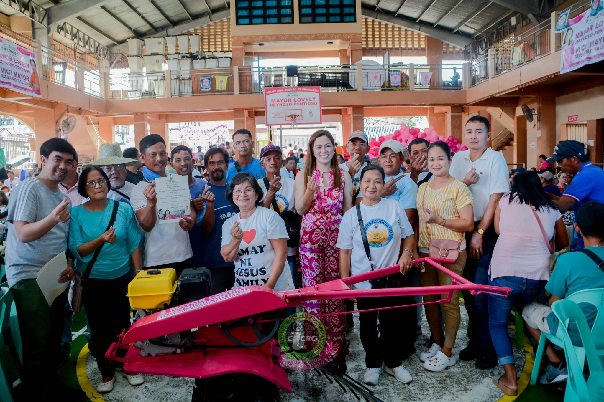 Tayabas City farmers receive hand tractor, rice thresher