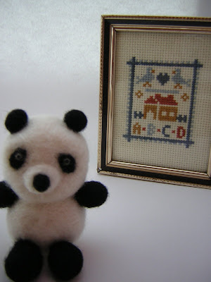 felted panda blury