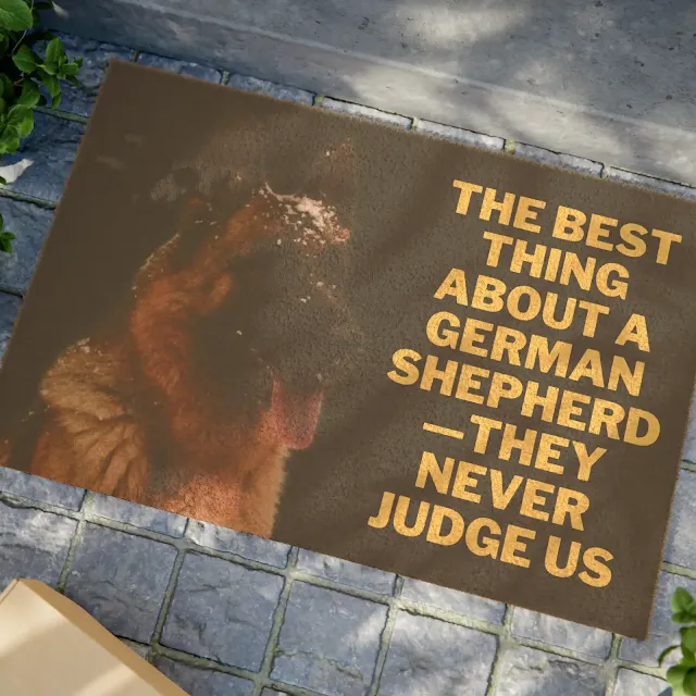 Doormat With Large Red and Black German Shepherd Close Up Face and Caption Best Thing About German Shepherd They Never Judge Us