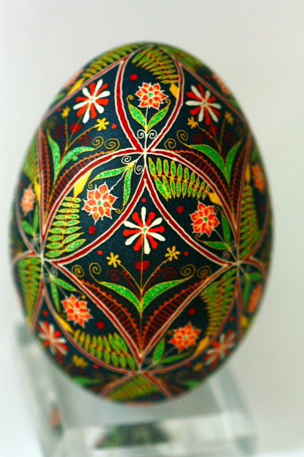 Pysanky Easter Egg Floral in Wedding Ring Quilt Pattern with Dark Background, Red and White Flowers, Ferns