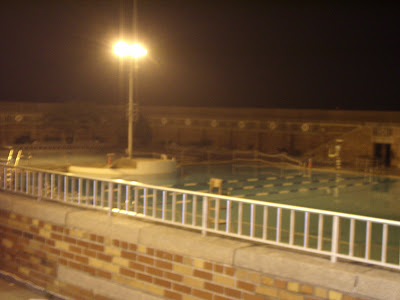 The swimming pool behind the Ice Cream Parlor / Food Court.