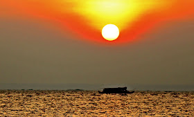 sunset on Lake Vembanad in Kerala, India