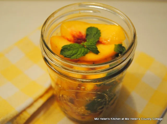 Icebox Pickled Peaches have a fantastic flavor and just may bring back some memories of pickles in the icebox! Miz Helen's Country Cottage