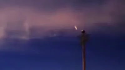 The UFO sighting streaking through the atmosphere.