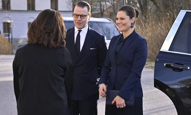 Crown Princess Victoria wore a Ruma navy blazer by Tiger of Sweden, and a navy pleated skirt by H&M