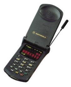 first flip phone, motorola, black plastic, antenna