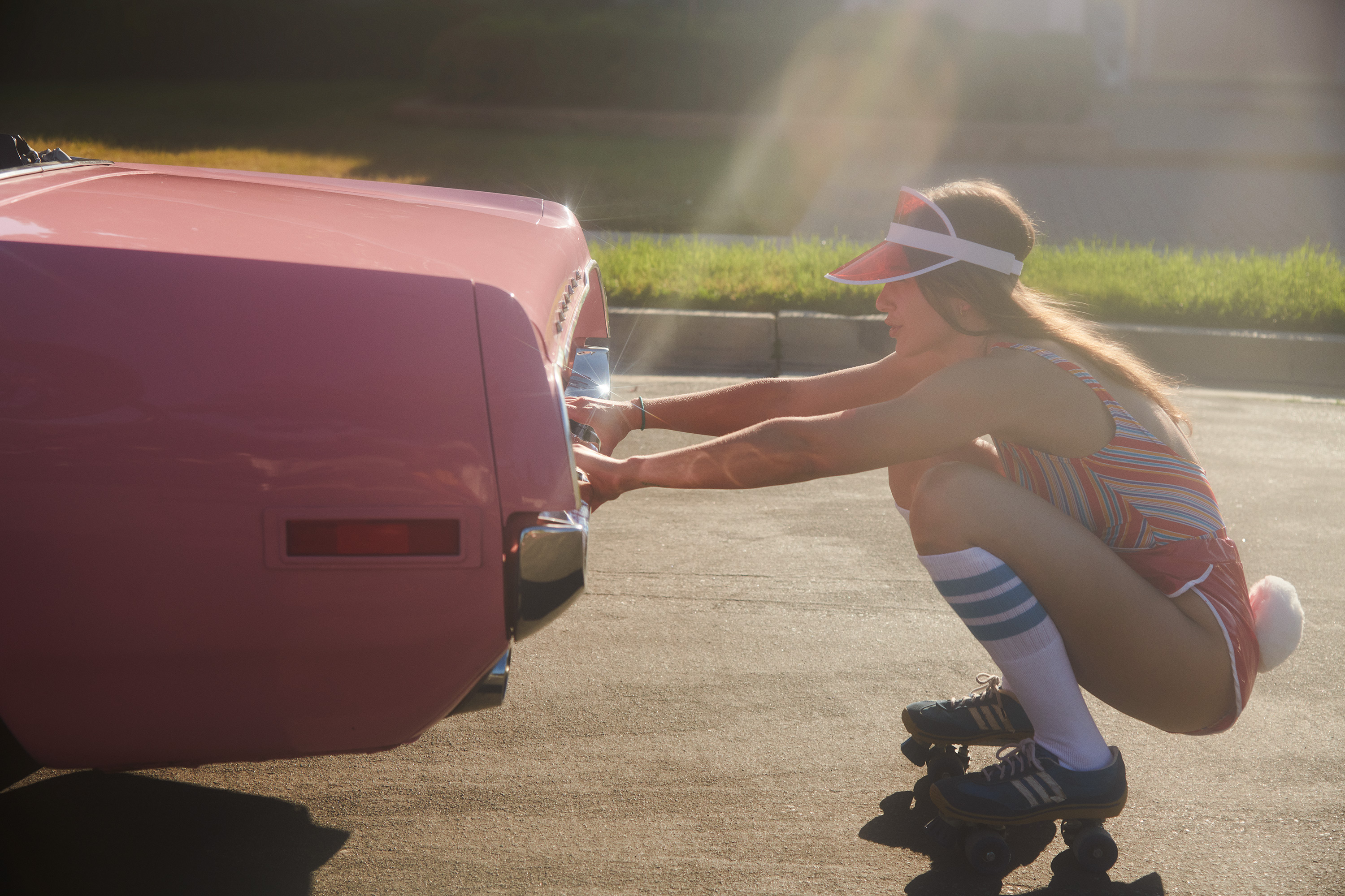 Rollergirl Boogie Nights 70s 80s Style Rollerskating Riding On Back Of Pink  Car Mustang Stunt Woman Playboy Bunny Tail Sunset Fashion Editorial  Photoshoot Gold Vivid Skates