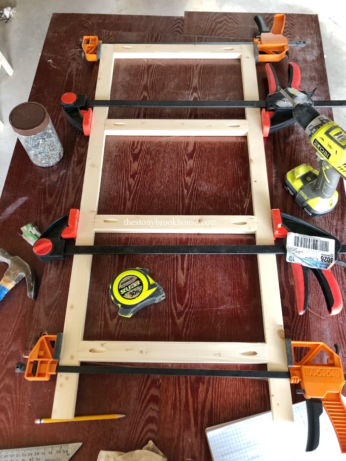 Ladder of shelf unit clamped together