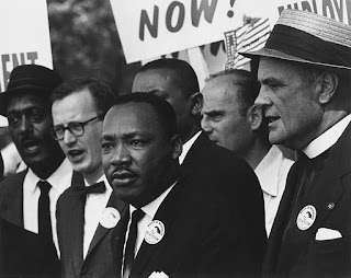 https://commons.wikimedia.org/wiki/File:Civil_Rights_March_on_Washington,_D.C._(Dr._Martin_Luther_King,_Jr._and_Mathew_Ahmann_in_a_crowd.)_-_NARA_-_542015_-_Restoration.jpg