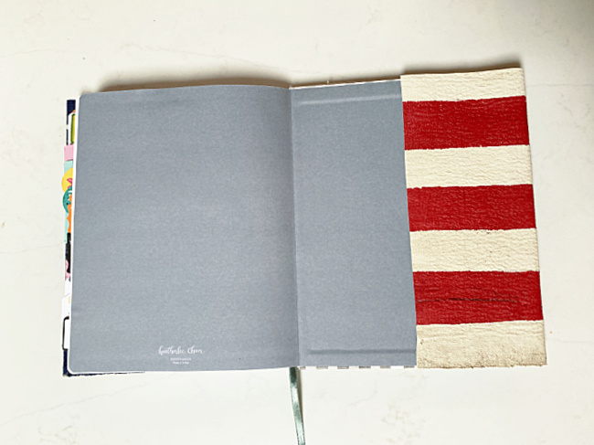 agenda book with folded flag edges
