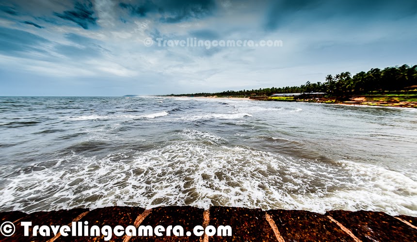 Sinquerim beach is first beach in Goa when we go from Panjim towards north part of Goa. This beach is 14 kilometers from Panjim and located near Aguada Fort . This Photo Journey shares some of the photographs clicked around Sinquerim Beach in Goa.Almost all the beaches in Goa was quite different although you can find subtle similarity among all the beaches in North vs South. We drove to Vivanta by Taj which oversees the Sinquerim beach. There is sufficient parking space. We parked the car and walked towards a huge fort structure just on the beach.This fort structure offers great views of powerful sea waves. I also tried to make a time-lapse video of these waves and failed miserably.There is awalking area around the fort wall, which offers great views of the sea and Sinquerim beach. Towards the end,there are few places to sit and relax. There are some really peaceful places where you can sit and hear the sounds of sea waves.One can see fishermen boats at the long distance. How many boats you see depends upon the weather and time of the day.This photograph was clicked while dirving back to Panjim from Sinquerim beach. There are multiple routes to reach a place in goa and some of the internal roads take you through some of the beautiful places. Agriculture is also one of the main occupations of Goan people. During monsoons, one can find lot of paddy fields around.Here is a photograph showing Vivanta by Taj which is just opposite to Sinquerim beach in Goa.Tourists enjoying the sea waves around Sinquerim beach.Sinquerim beach is relatively cleaner and less crowded, as compared to other beached in North Goa. Although water sport activities are little expensive at Sinquerim beach. This is a lovely place near Vivanta by Taj, where you can sit for long hours and enjoy activities happening around the sea.
