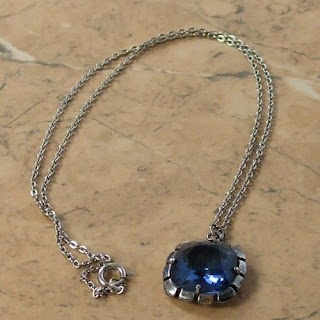 Blue glass pendant necklace by Exquisite