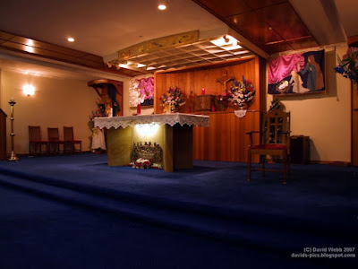 inside a catholic church at Christmas time - church decorations for Christmas in the sanctuary