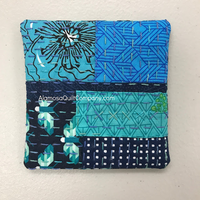 Blue stitched meditations pin cushion