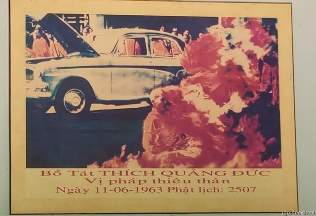 The famous photo of the monk in flames is hung behind the car. The Austin could be seen in the background.