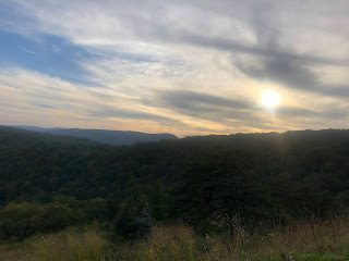 A sunset over a forested mountain, taken from an overlook at Shenandoah.