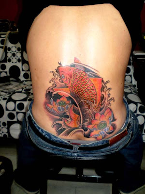 koi tattoo pictures. koi tattoo design on the hip