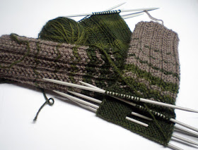 beige and green knitted socks in progress
