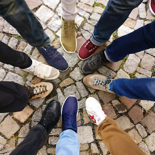 legs with colorful shoes