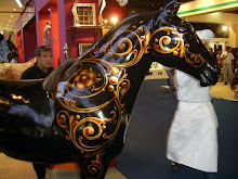 CABALLO NEGRO Y ORO