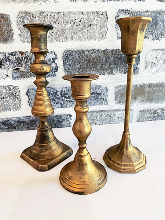 set of brass looking candlesticks