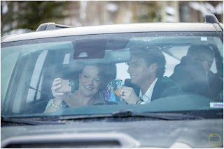 bride and groom on a facetime call talking with grooms parents