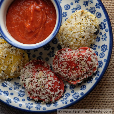 Heart-shaped cheese-filled ravioli dipped in a tangy sauce and coated with seasoned breadcrumbs, then baked. Serve with sauce to dunk and you've got a kid friendly vegetarian Valentine's day meal.