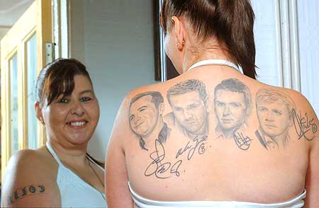 I may not know who these people are which are tattooed on this woman's back