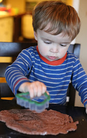 A new recipe for Chocolate ornament dough.  Make some hot cocoa and settle in for some delicious smelling homemade ornament creating!  From Fun at Home with Kids