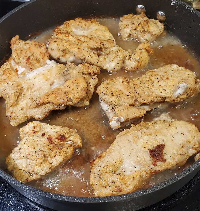 sauteed chicken breasts in butter coated with flour