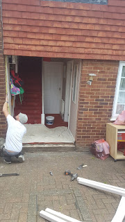 A solo door fitter fitting my new Front Door