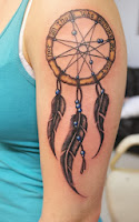 dreamcatcher tattoo arm