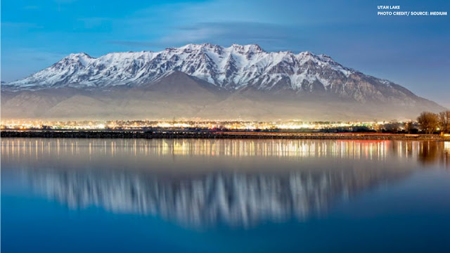 Mountain and Lights reflected in Utah Lake