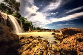 In the beautiful Sunset Waterfall Toroan - East Java