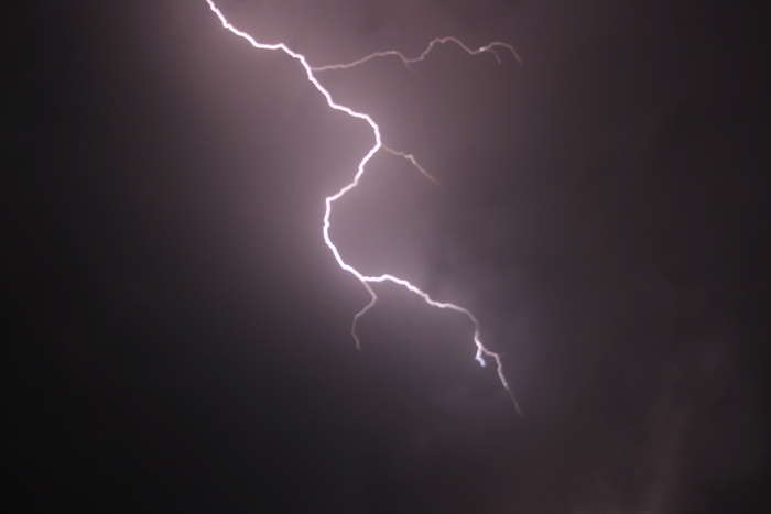 Fierce lightning strike against a dark sky