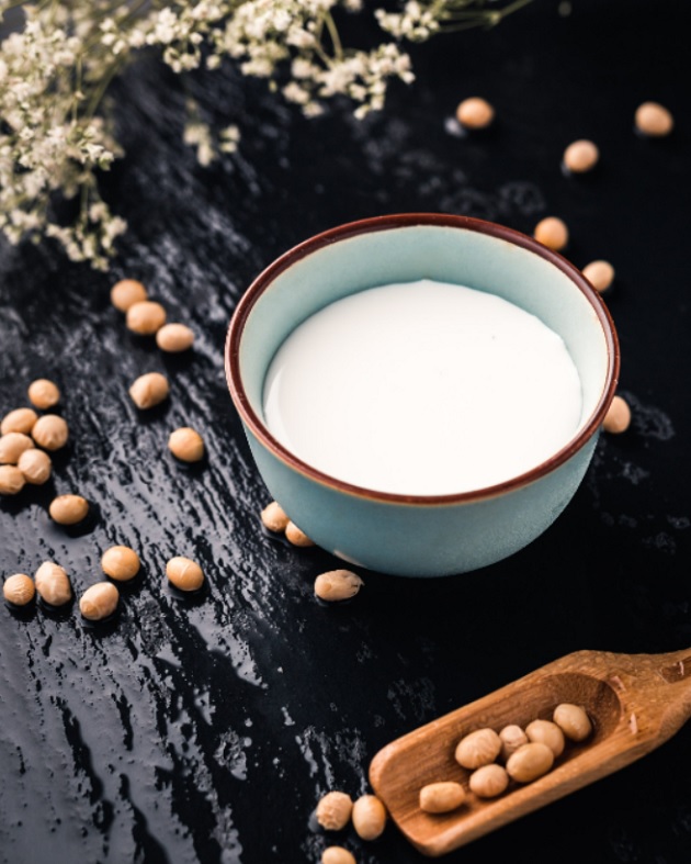 A bowl of soy milk was just freshly prepared.