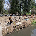 Puluhan Makam Terbawa Arus Irigasi di Tanjung Morawa