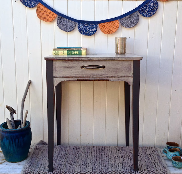 antique seing table grey with bunting books