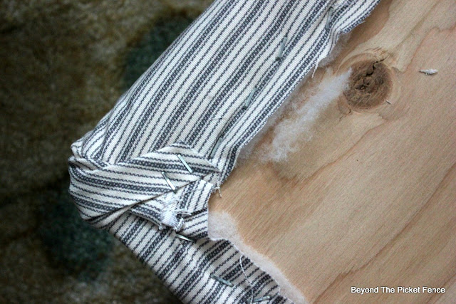 footstool, ottoman, upholstered, DIY, pillow ticking, upcycled, http://bec4-beyondthepicketfence.blogspot.com/2016/03/the-accidental-footstool.html