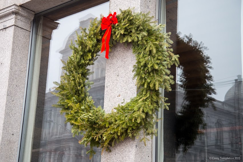 Portland, Maine USA December 2015 photo by Corey Templeton. A festive wreath on the side of the Thomas Block building at 100 Commercial Street. 