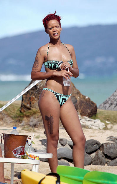 Rihanna Shows Off Gun Tattoo on Thigh: