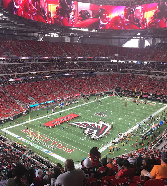 Atlanta Falcolns NFL Mercedes Benz Stadium Football Game