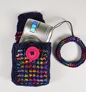 http://www.ravelry.com/patterns/library/camera-pocket