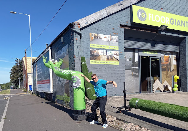 A wacky waving inflatable arm-flailing tube man in Stockport