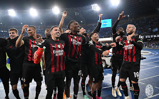 AC Milan players celebrate reaching the semi finals of the Uefa Champions League for the first time since winning the competition in 2007