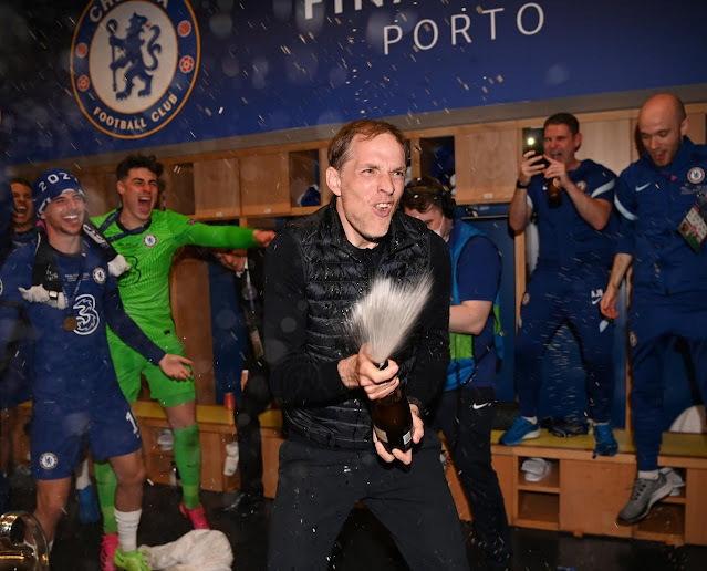 Thomas Tuchel popping champagne after Chelsea's champions league win