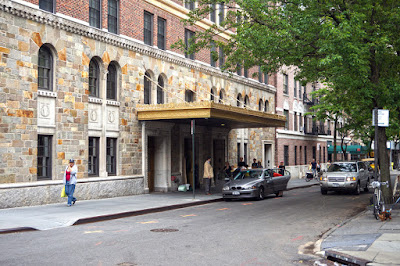 Historic gold colored, covered building entrance