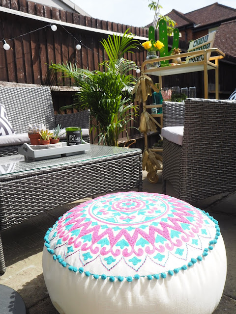 Miami South Beach inspired garden outdoor makeover creating a summer dining area on a budget and using items from the high street. Featuring colourful homeware and interiors, and an IKEA hack turning a Sunnersta trolley into a glamorous drinks trolley bar cart.