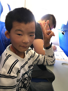 Chinese boy on airplane